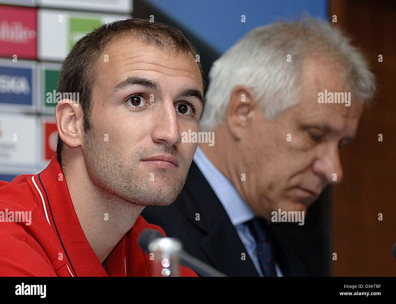 (dpa) - Slovakian soccer player Robert Vittek (L), who is currently sign with 1st FC Nuremberg, sits next to Dusan Gallis, head coach of the Slovakian national soccer team, during a press conference in Bratislava, Slovakia, Friday, 02 September 2005. The German national soccer squad is going to play in the international match against Slovakia on Saturday, 03 September 2005. Stock Photo