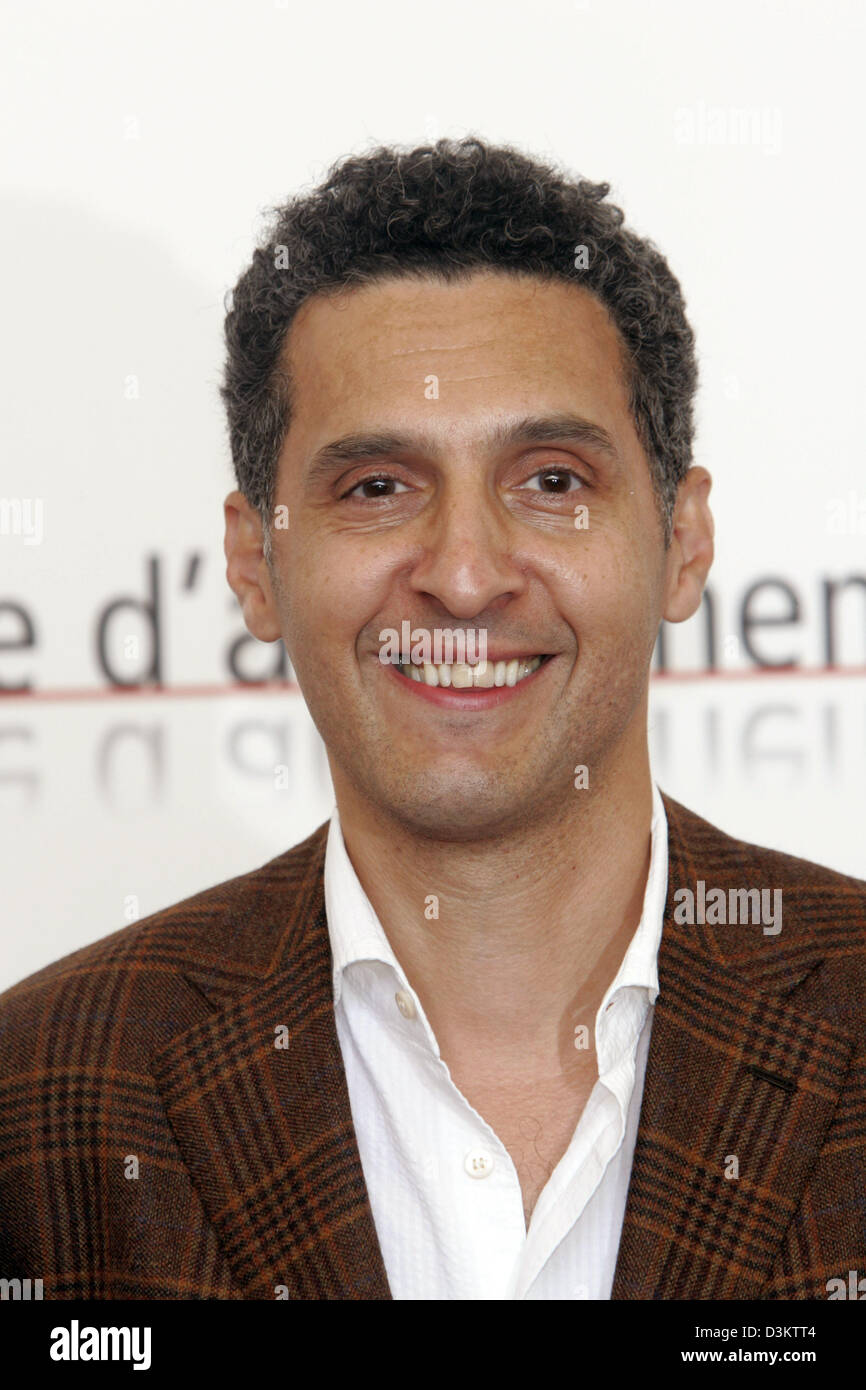(dpa) - US American director John Turturro smiles at the film premiere of 'Romance and Cigarettes' at the 62th International Film Festival in Venice, Italy, 6 September 2005. Photo: Hubert Boesl Stock Photo