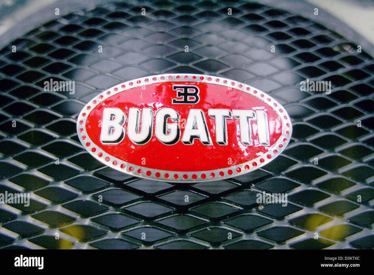 (dpa) - The logo of car manufacturer Bugatti pictured on the hood of the new model EB Veyron 16.4 in the factory in Molsheim, France, Thursday 8 September 2005. After several delays the Volkswagen daughter Bugatti Automobiles SAS releases the most expensive and fastest car permitted for the road traffic. In the following year a maximum of 300 exemplars of 1001 HP strong and 407 km/ Stock Photo