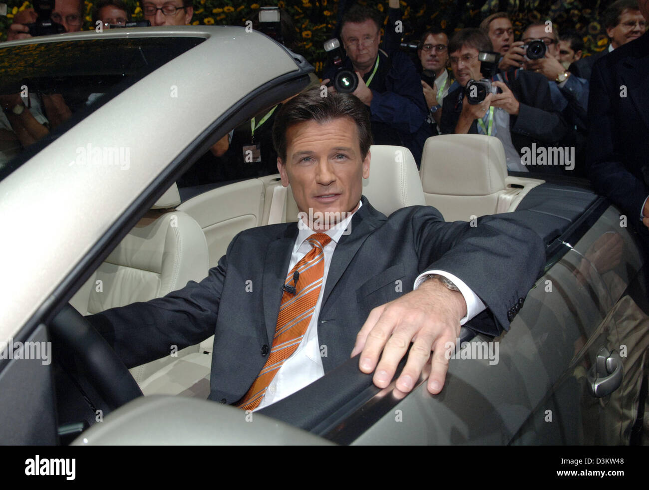 (dpa) - The picture shows Volkswagen chairman Wolfgang Bernhard at the steering wheel of VW's new 'EOS' at the 61st International Motor Show (IAA) in Frankfurt Main, Germany, Monday 12 September 2005. The IAA is the world most comprehensive automobile show of the whole industry with almost 1.000 exhibitors from 44 countries. The fair's organisers expect one million visitors. Photo: Stock Photo