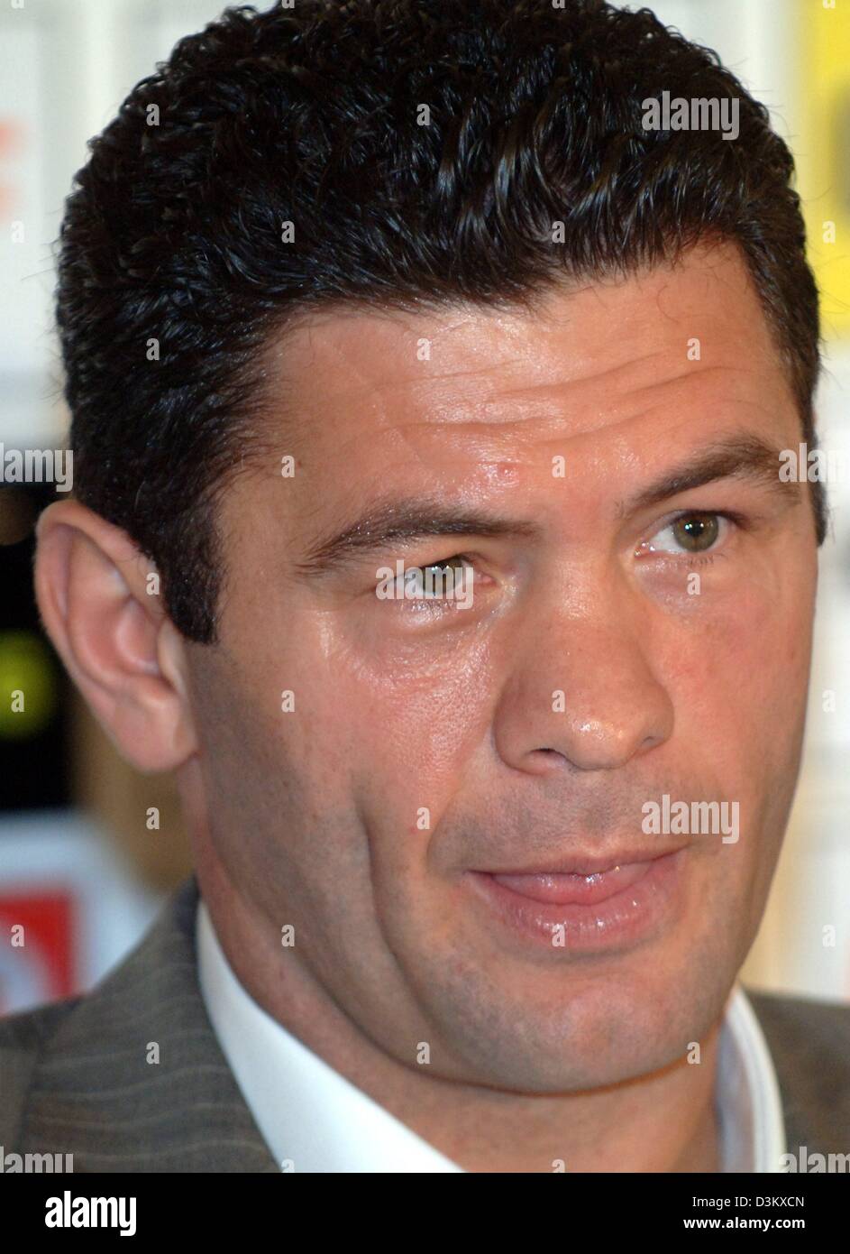(dpa) -Challenger Kosovo-Albanian Luan Krasniqi smiles during a press conference six days prior to his heavy weight bout against US American WBO heavy weight champion Lemon Brewster in Hamburg, Germany, 22 September 2005. Photo: Maurizio Gambarini Stock Photo