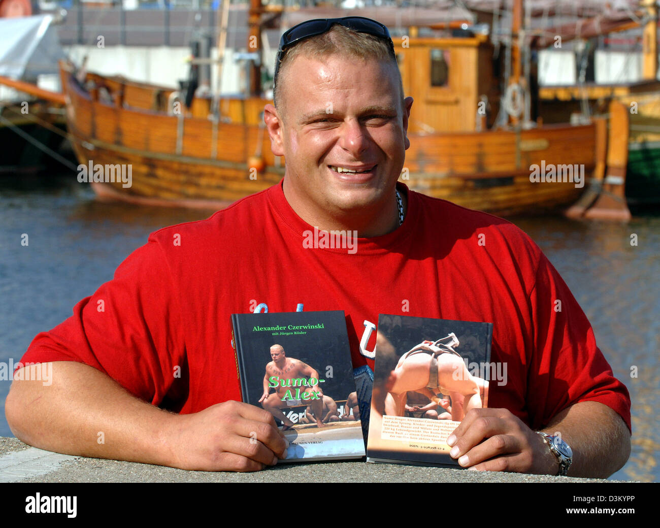 (dpa) - Former world champion in sumo wrestling Alexander Czerwinski presents his new book 'Sumo-Alex' in Rostock, Germany, Friday, 07 October 2005. 36-year old Czerwinski admitted during the book presentation that he had consumed doping drugs in his younger days. He is currently suspended by the German Sumo Association after having been tested positive for Nandrolon during a dopin Stock Photo