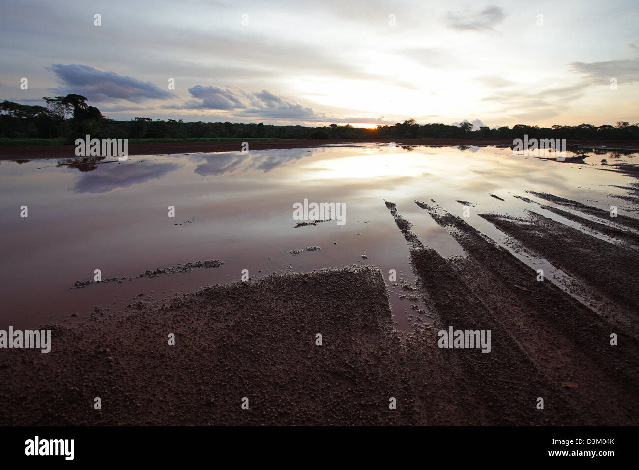 Reflections in water at sunset Stock Photo - Alamy