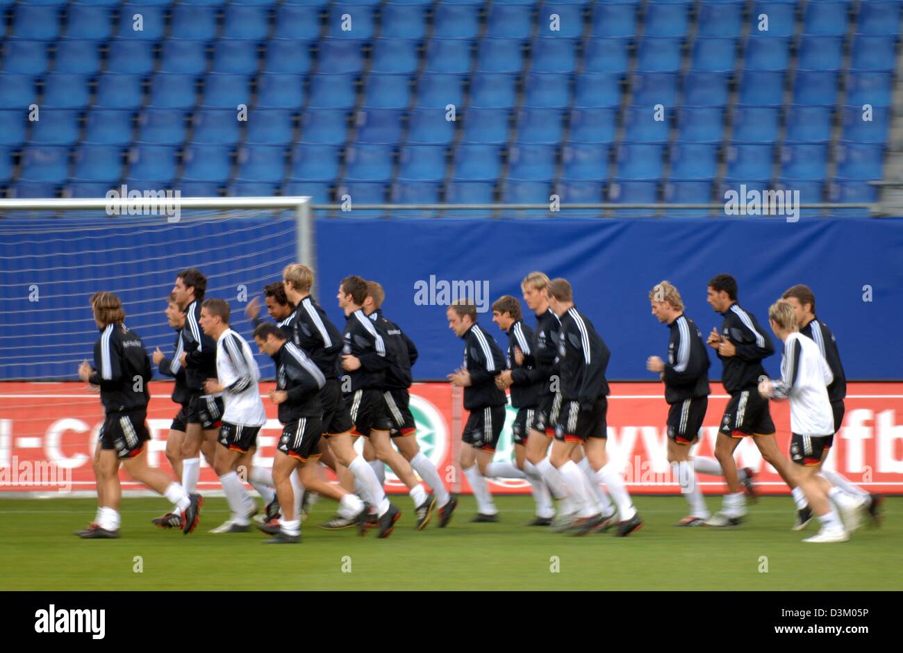 Sports spo soccer running practicing exercising pitch team squad ...