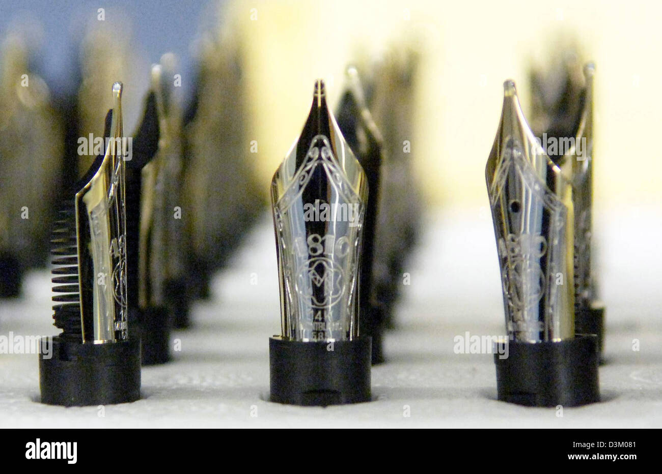 (dpa) Fountain pen nibs stand together in the manufacturing of the company in Hamburg, Germany