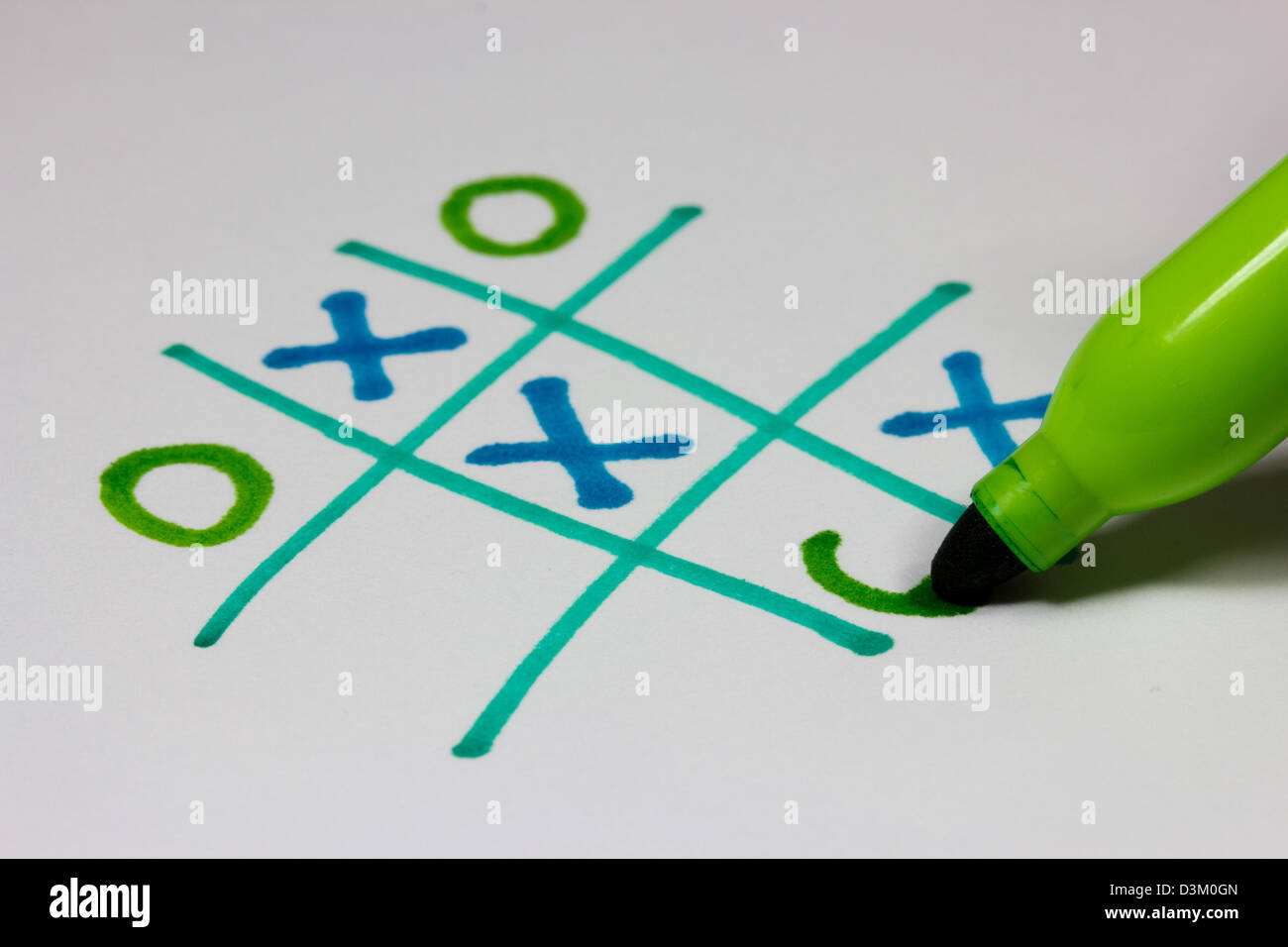 A game of Xs and Os (tic-tac-toe / noughts and crosses) Stock Photo