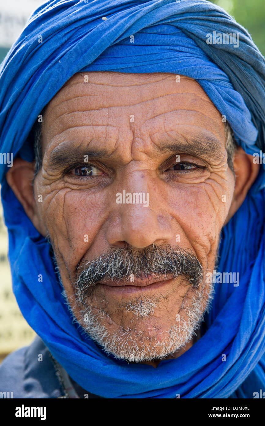 Moroccan man wearing a blue Bedouin head scarf, Imlil, Morocco Stock