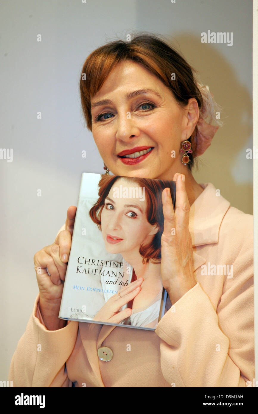 (dpa) - German actress Christine Kaufmann (60) presents her autobiography 'Christine Kaufmann and I. My double life' at the Frankfurt Book Fair in Frankfurt, Germany, 19 October 2005. Photo: Uwe Zucchi Stock Photo