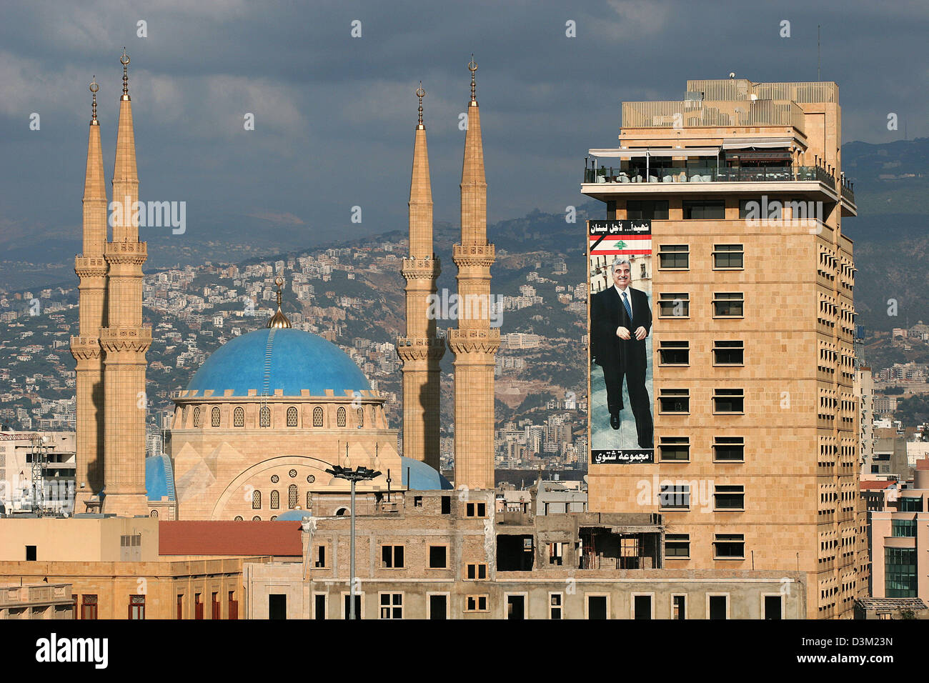 (dpa) - The picture shows a new mosque (L) and a building with a billboard of the murdered politician Rafik Hariri in Beirut, Lebanon, 01 October 2005. Former Lebanese Prime Minister Hariri and 20 other people got killed in a bomb attack on 14 February 2005. Regarding to a UN report publicised on 21 October 2005, Syrian security forces were involved in the assassination. Photo: Oli Stock Photo
