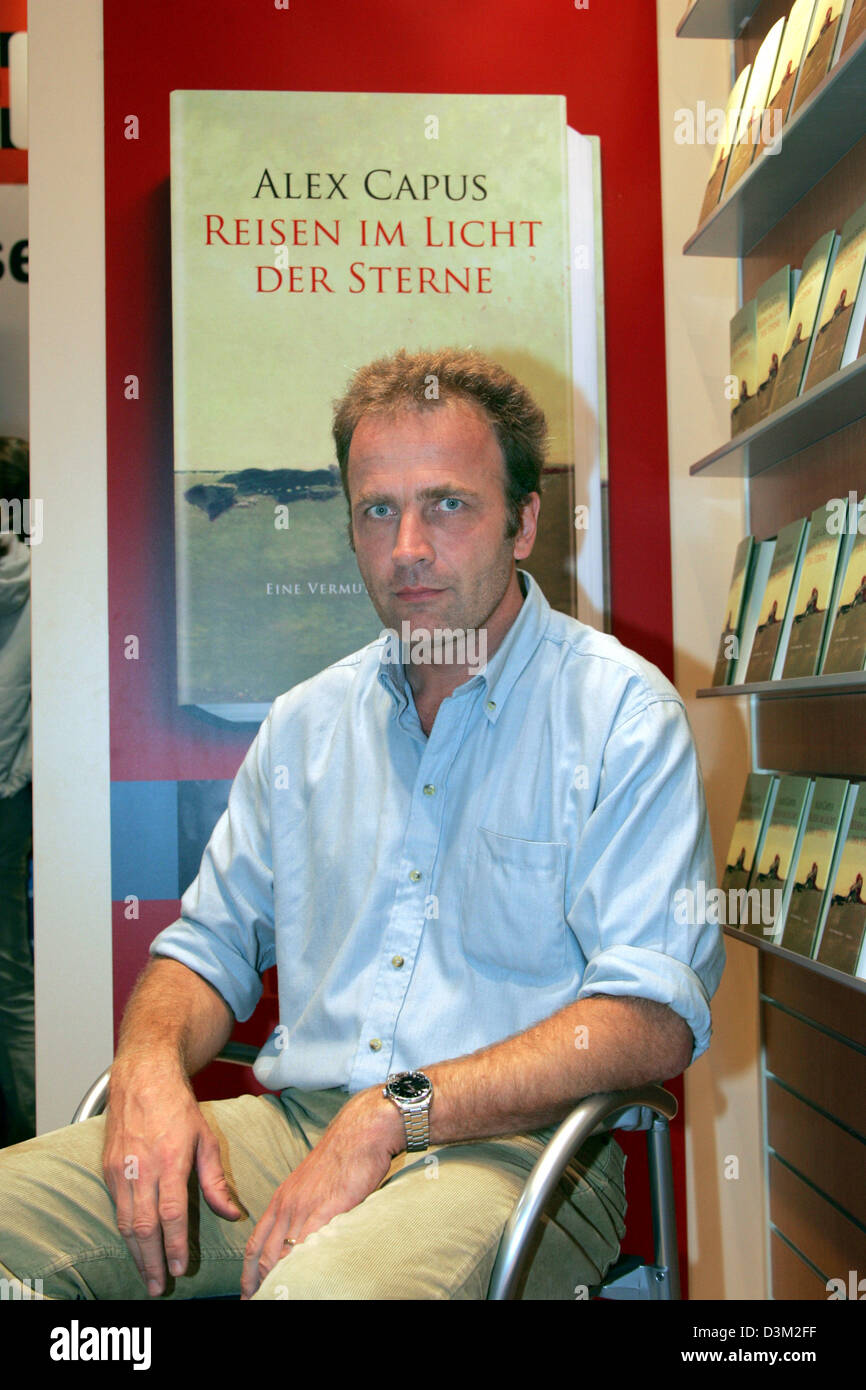 (dpa) - French author Alex Capus (44) smiles at the Frankfurt Book Fair 2005 in Frankfurt Main, Germany,  22 October 2005. Photo: Uwe Zucchi Stock Photo