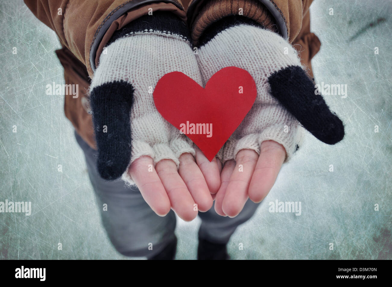 Female holding red heart hi-res stock photography and images - Alamy