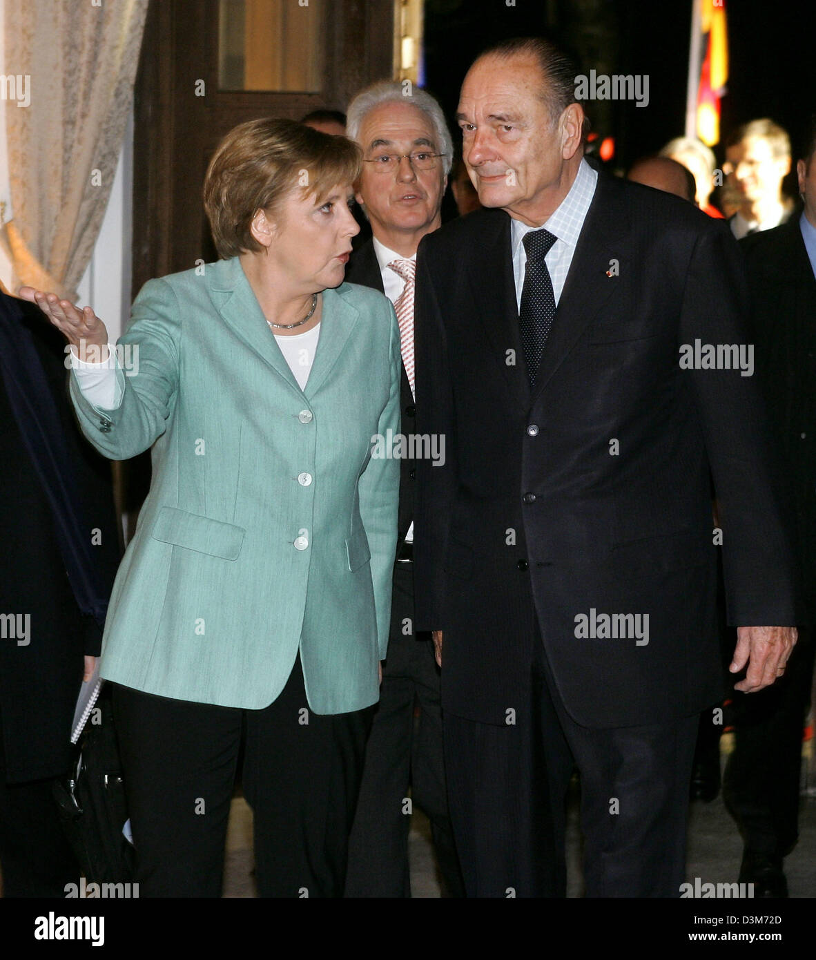 (dpa) - French President Jacques Chirac and German Chancellor Angela Merkel meet for talks at Glienicke hunting seat, Berlin, Germany, 08 December 2005. It is Chirac's first visit to Germany since Merkel took office as chancellor. High on the agenda of discussions between the two leaders was the current row in Brussels over the future EU budget. Photo: Sean Gallup Stock Photo