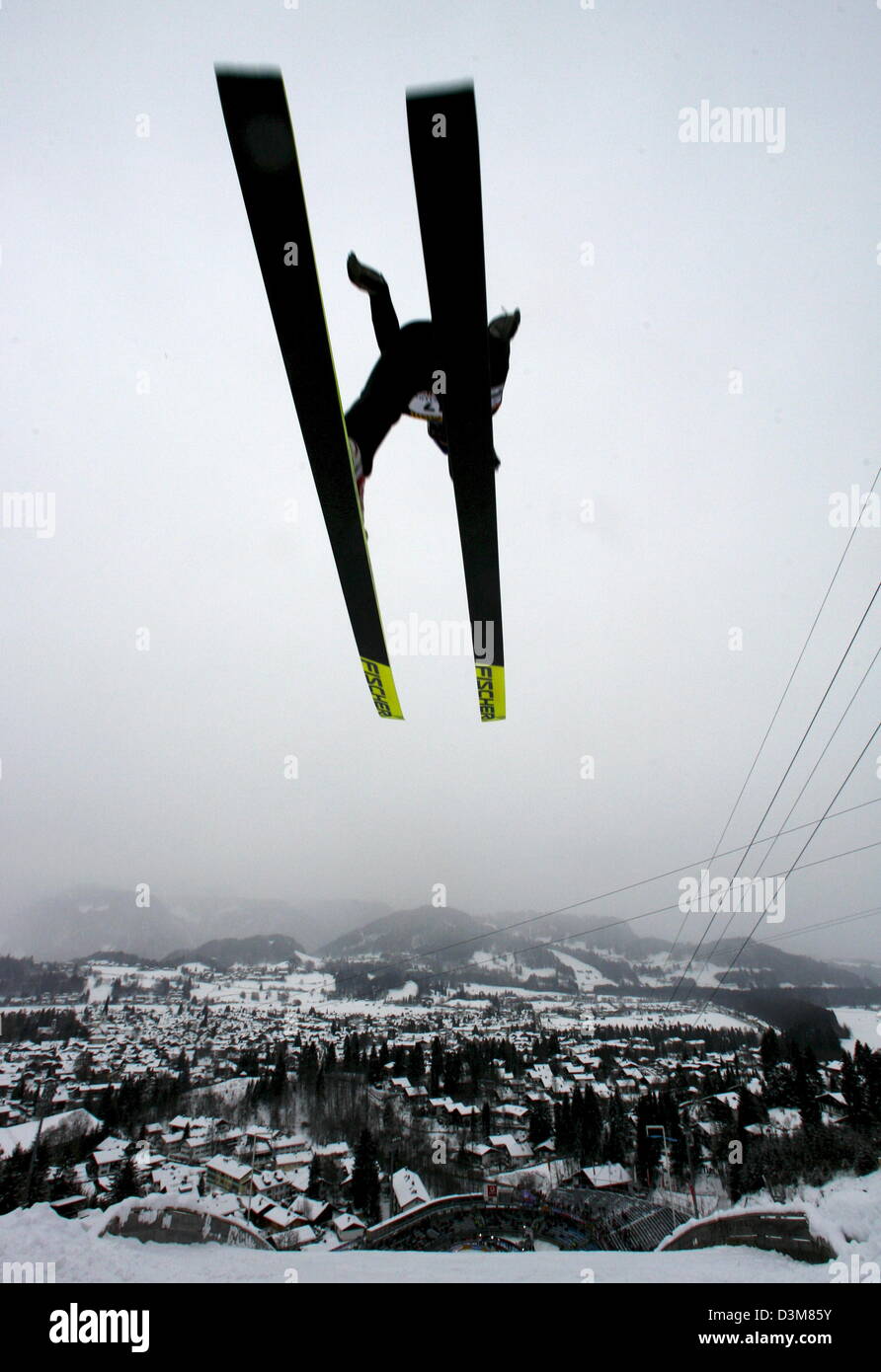 (dpa) - The picture shows a ski jumper airborne in action during the preliminaries of the 54th Four Hill Tournament on the Schattenberg ski jump in Oberstdorf, Germany, Wednesday, 28 December 2005. Photo Peter Kneffel Stock Photo