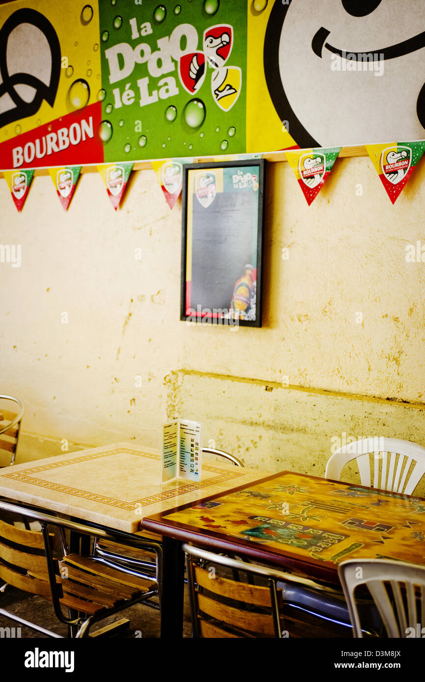 Inside a cafe next to Hotel Tsilaosa off main high street in Cilaos, French island Reunion, Indian Ocean - Bourbon is local beer Stock Photo