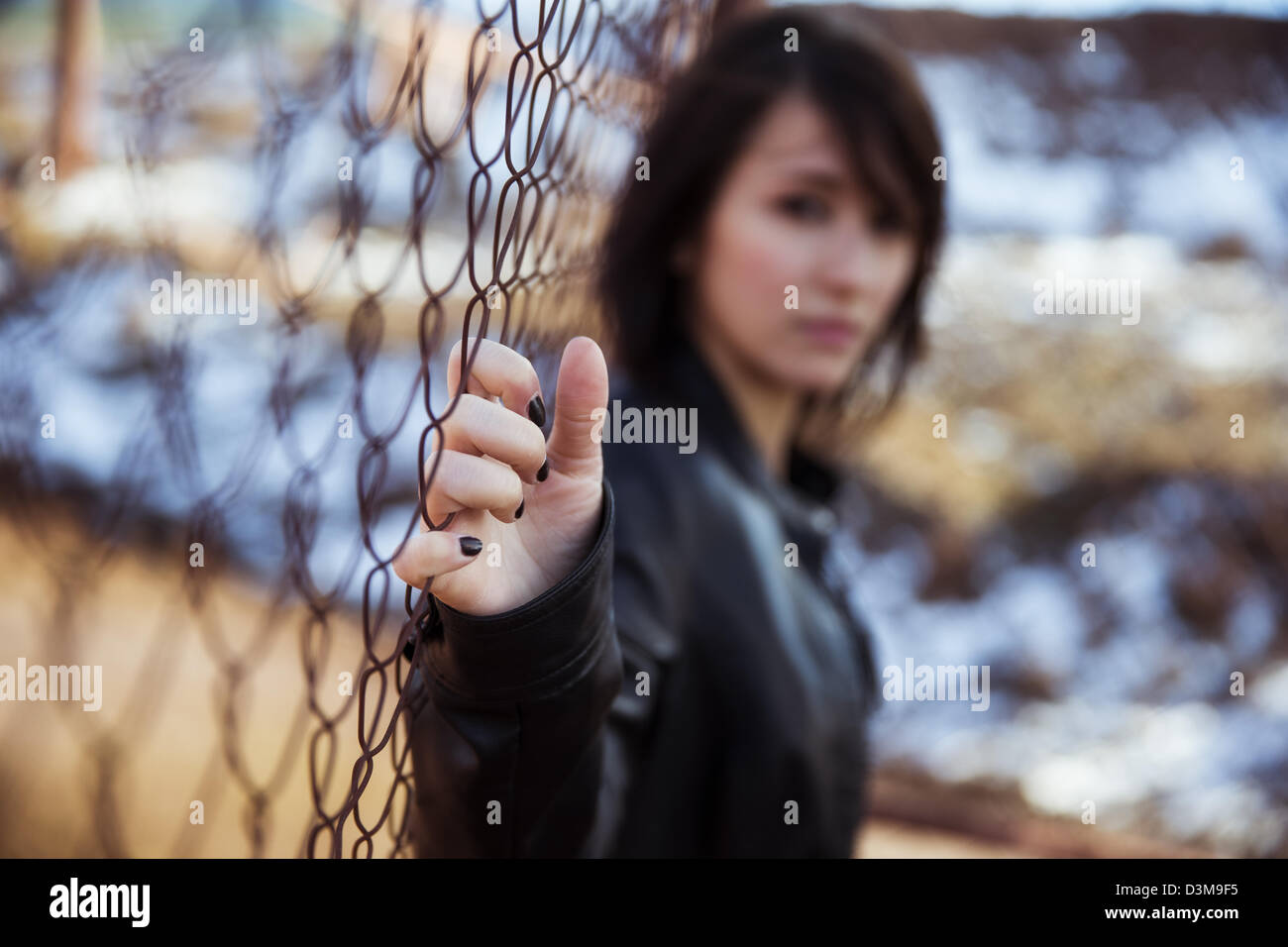 Young anonymous woman staring at camera. Stock Photo