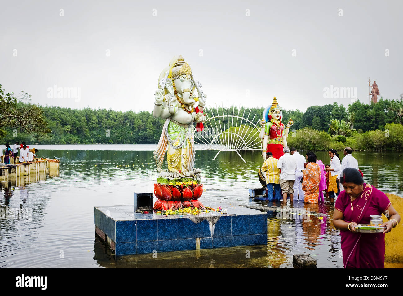 Hindus make offerings to Hindu Gods at Grand Bassin at Ganga Talao lake, Mauritius - considered holiest place in Mauritius Stock Photo
