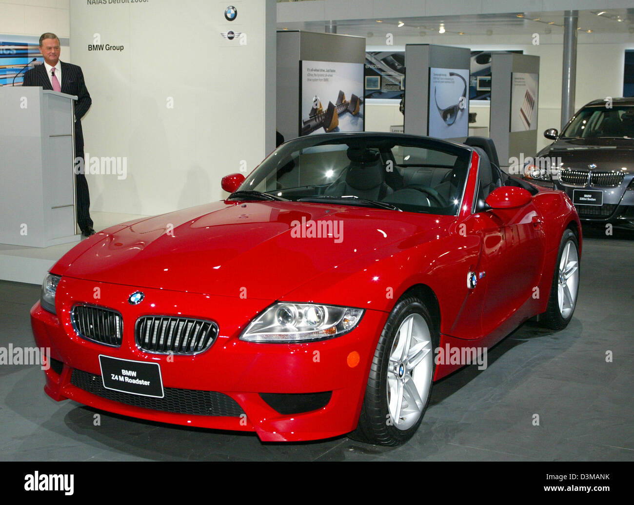 (dpa) - Tom Purves (L), president of BMW North America, presents the ...