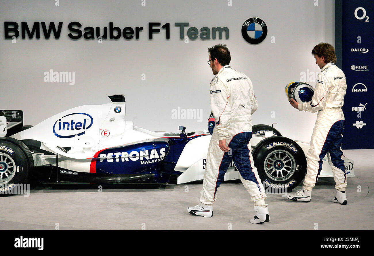 (dpa) - German Formula One pilot Nick Heidfeld (R) and his Canadian team mate Jaques Villeneuve (L) pictured during the presentation of the new BMW Sauber race car 'F1.06' in Valencia, Spain, Tuesday 17 January 2006. Photo: Gero Breloer Stock Photo