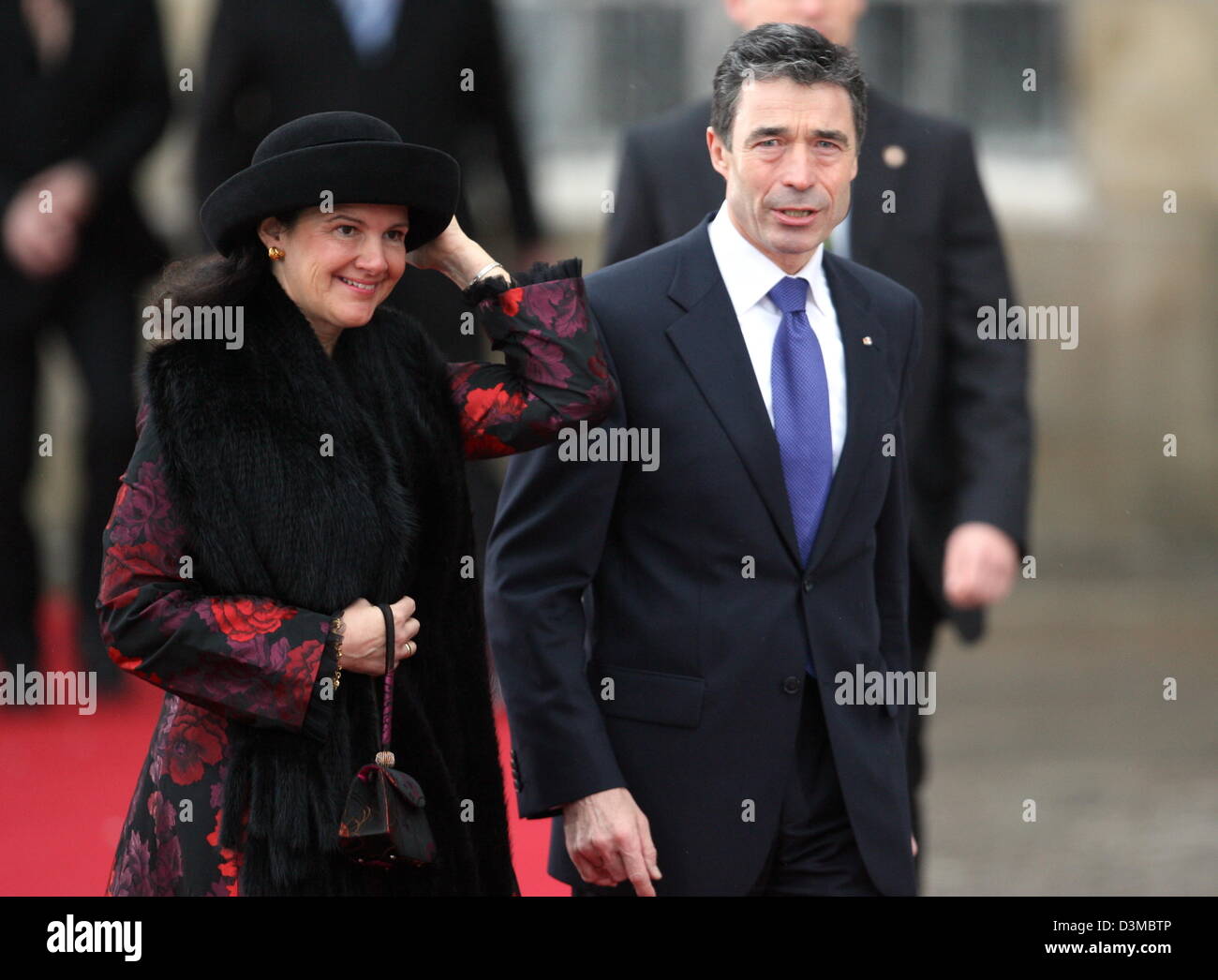 Anders Fogh Rasmussen, Pime Minister of Denmark (R), and his wife Anne-Mette arrive at the Castle Christiansborg chapel in Copenhagen, Denmark, 21 January 2006. The son of Crown Prince Frederik and Princess Mary of Denmark was christened in the church. The name of the baby born on 15 October 2005 was acquainted to the public at the baptism. He is baptised on the name Christian Vald Stock Photo