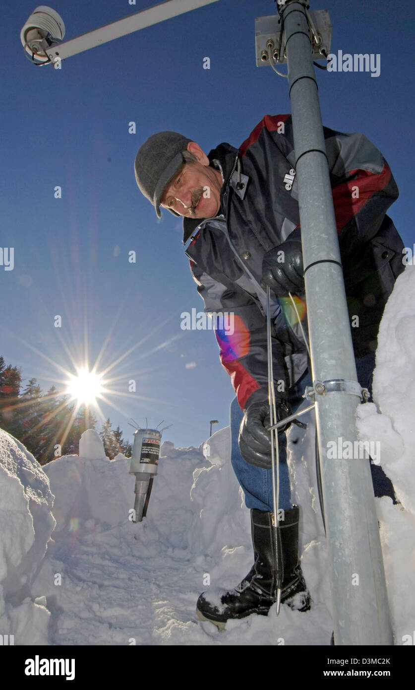 Josef Zellner checks up on the thermometer at the meteorological