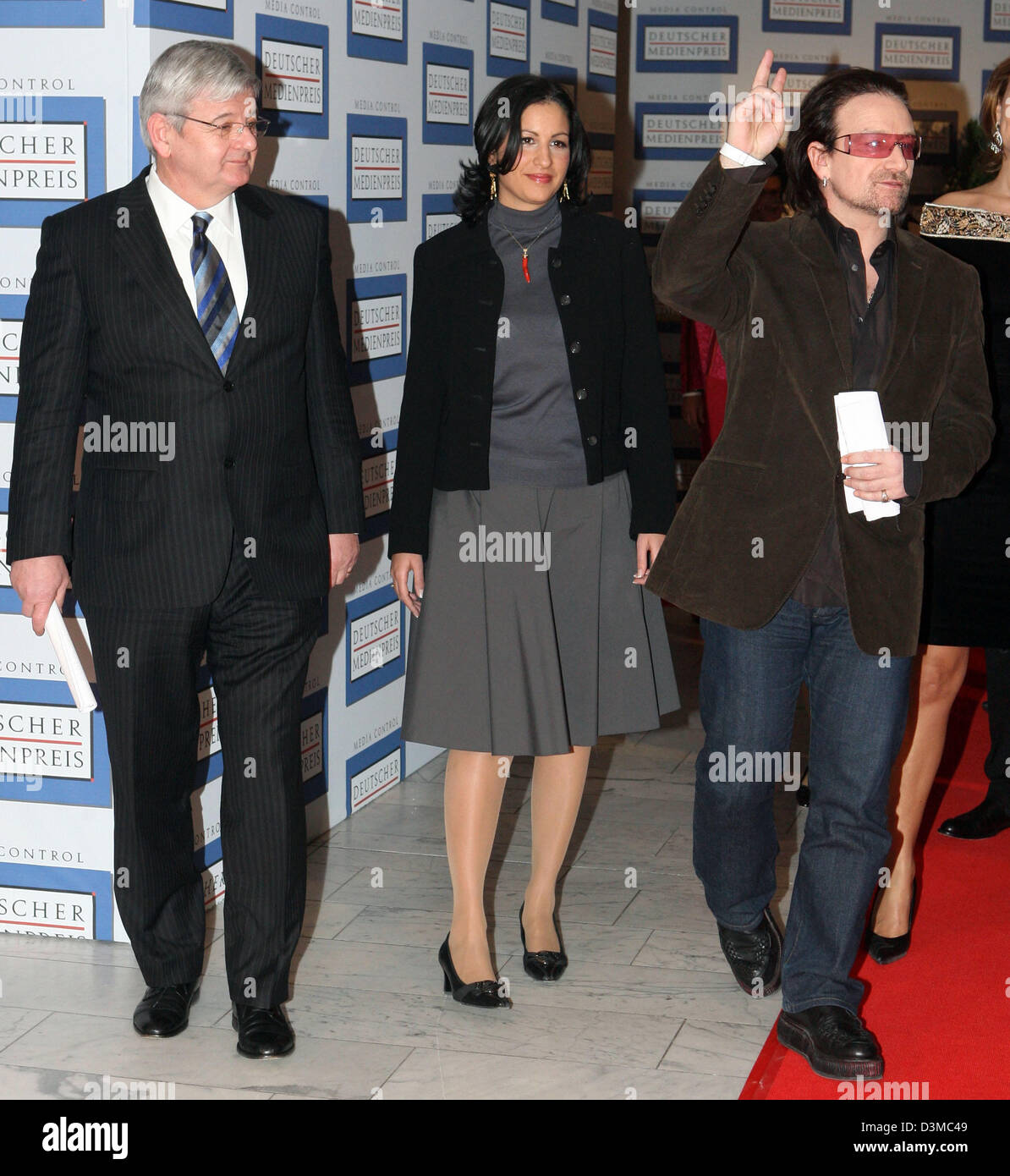 Former German Foreign Minister Joschka Fischer and his wife Minu Barati arrive for the award ceremony of the German Media Prize 2005 to Bono, the lead singer of the Irish rock band U2, at the convention in Baden-Baden, Germany, Tuesday, 24 January 2006. Fischer held the honourific speech in honour of Bono, the lead singer of the Irish rock band U2, who was awarded with the German M Stock Photo