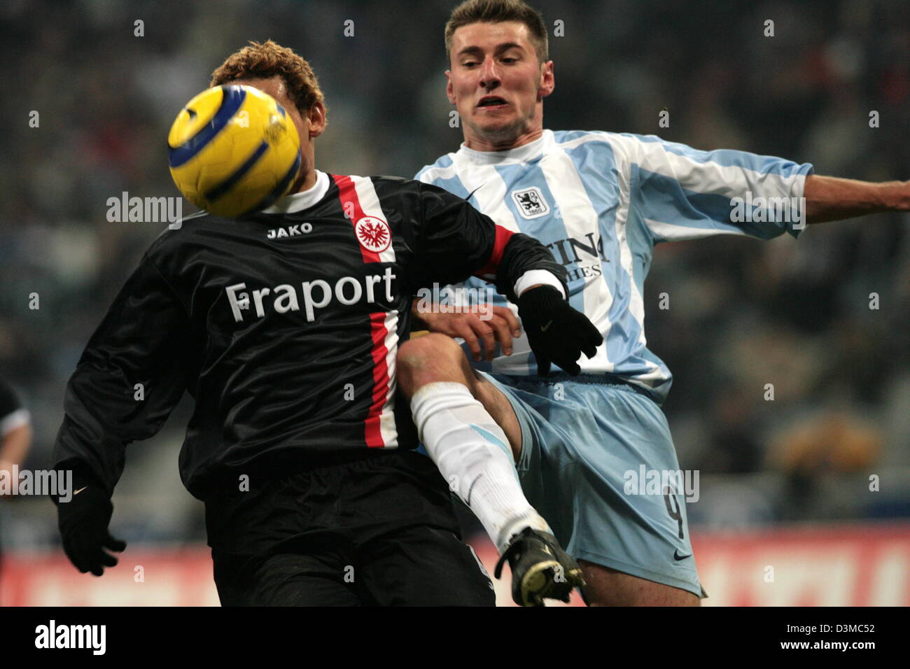 Bayern Munich's Willy Sagnol (R) and 1860 Munich's Lars Bender (L) shown in  action during the soccer friendly FC Bayern Munich vs TSV 1860 Munich at  Allianz-Arena in Munich, Germany, 26 January