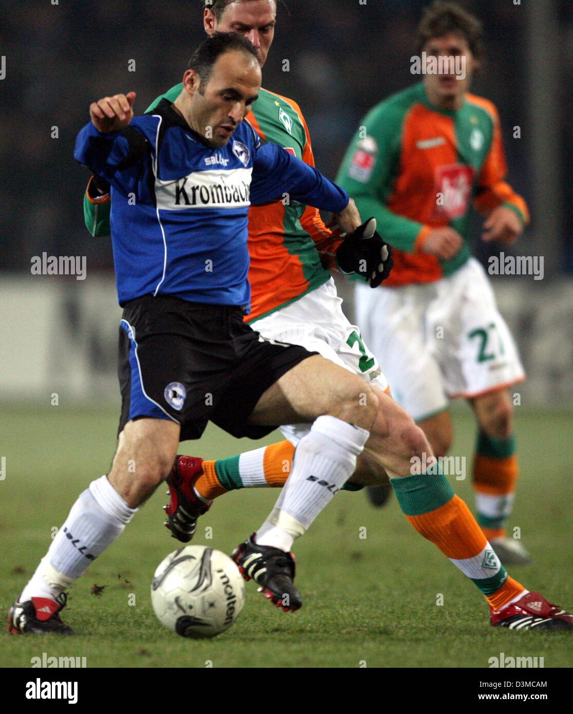 Bielefeld Player Fatmir Vata L Vies For The Ball With Bremen Players bielefeld-player-fatmir-vata-l-vies-for-the-ball-with-bremen-players