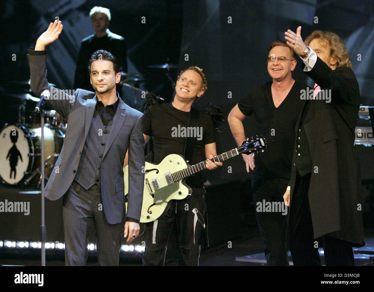 Dave Gahan (L), frontman of Electropop cult band 'Depeche Mode' waves to  the fans at the German TV show 'Wetten, dass...?' (Bet, that...) in the  Salzburg Arena in Salzburg, Germany, 28 January