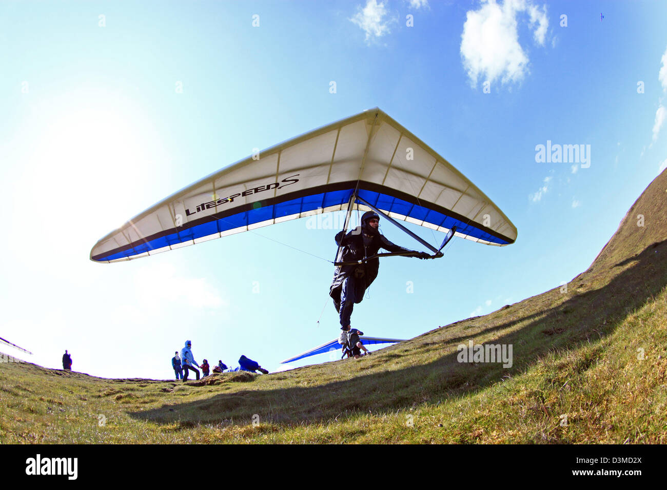 Hang glider pilot launching from the Malvern Hills in Worcestershire UK  Stock Photo - Alamy