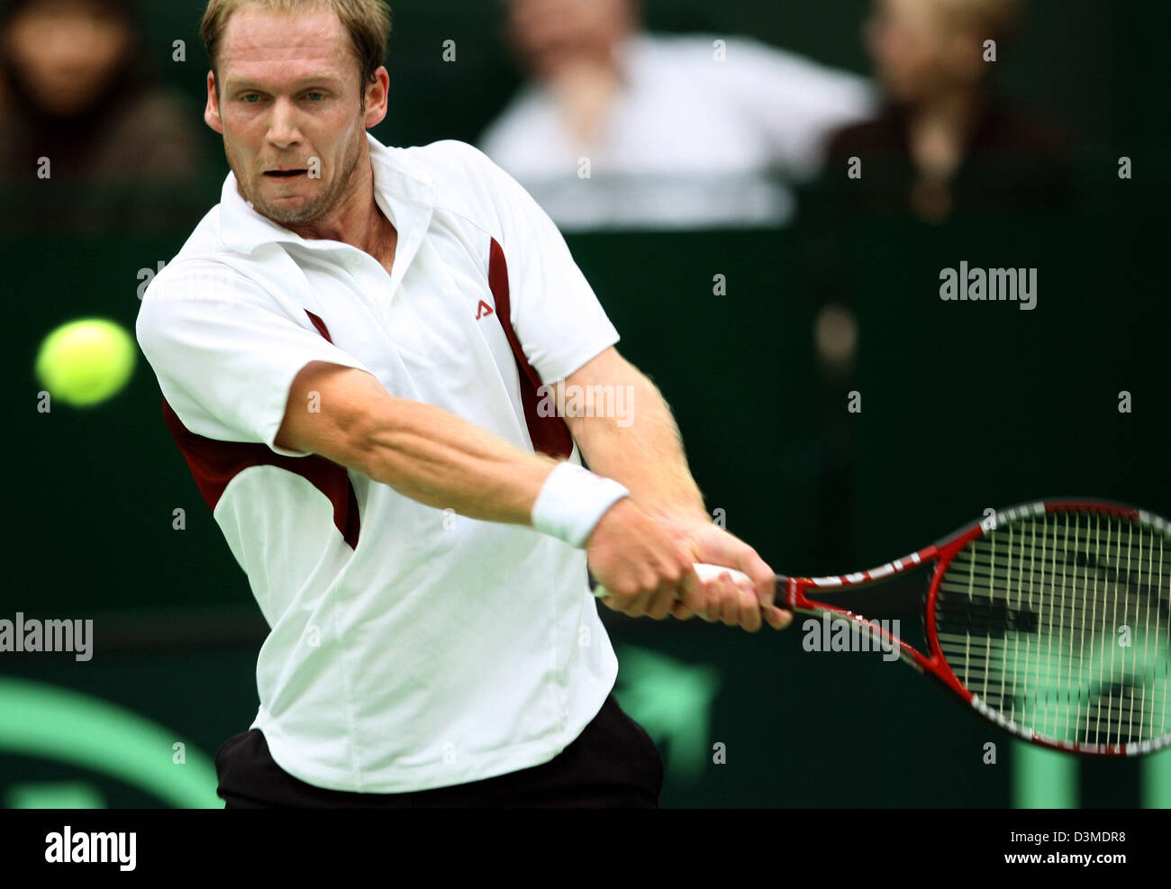 The German tennis pro Rainer Schuettler plays a backhand against French ...