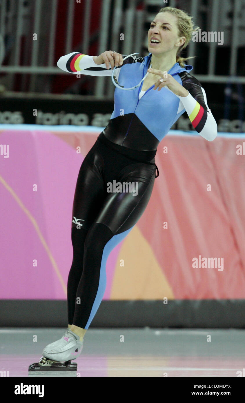 German speed skater Anni Friesinger disappointedly glides over the ice  after the women's 3000 m competition at the XX Winter Olympics in Turin,  Italy, Sunday 12 February 2006. Dutch speed skater Ireen