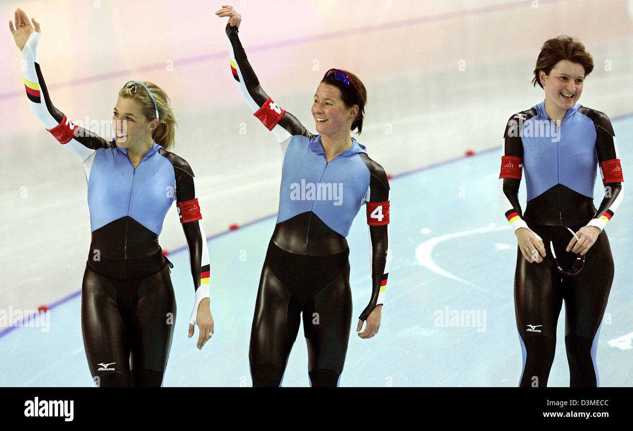 The German Speed Skating team with (L-R) Anni Friesinger, Claudia Pechstein and Daniela Anschuetz-Thoms wave to the fans after the Speed Skating Ladies's Team Pursuit semifinal in the Olympic speed skating rink Lingotto, Italy, 16 February 2006. The German stood up to Canada and claimed gold. Photo: Frank May Stock Photo