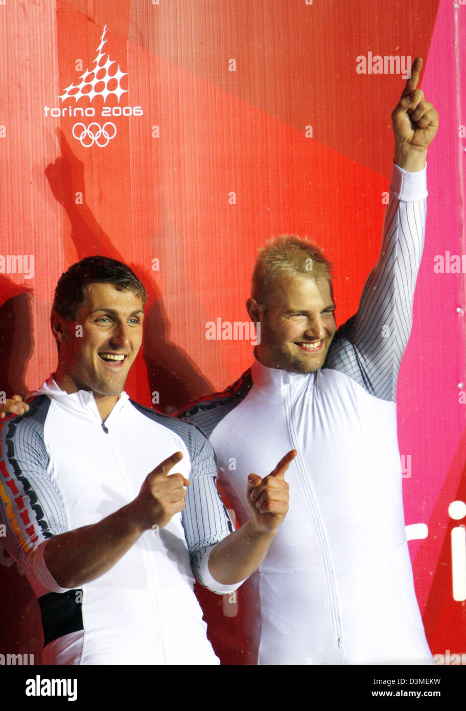 German bobsleighers Andre Lange (L) and Kevin Kuske celebrate after