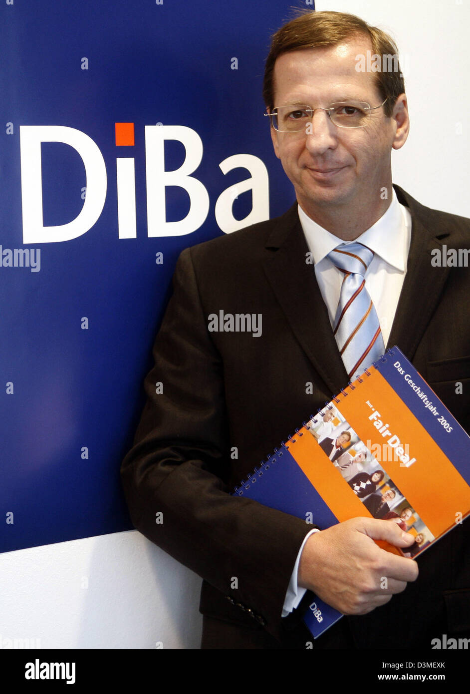 ING-DiBa bank CEO Ben Tellings smiles in front of the company's logo ...