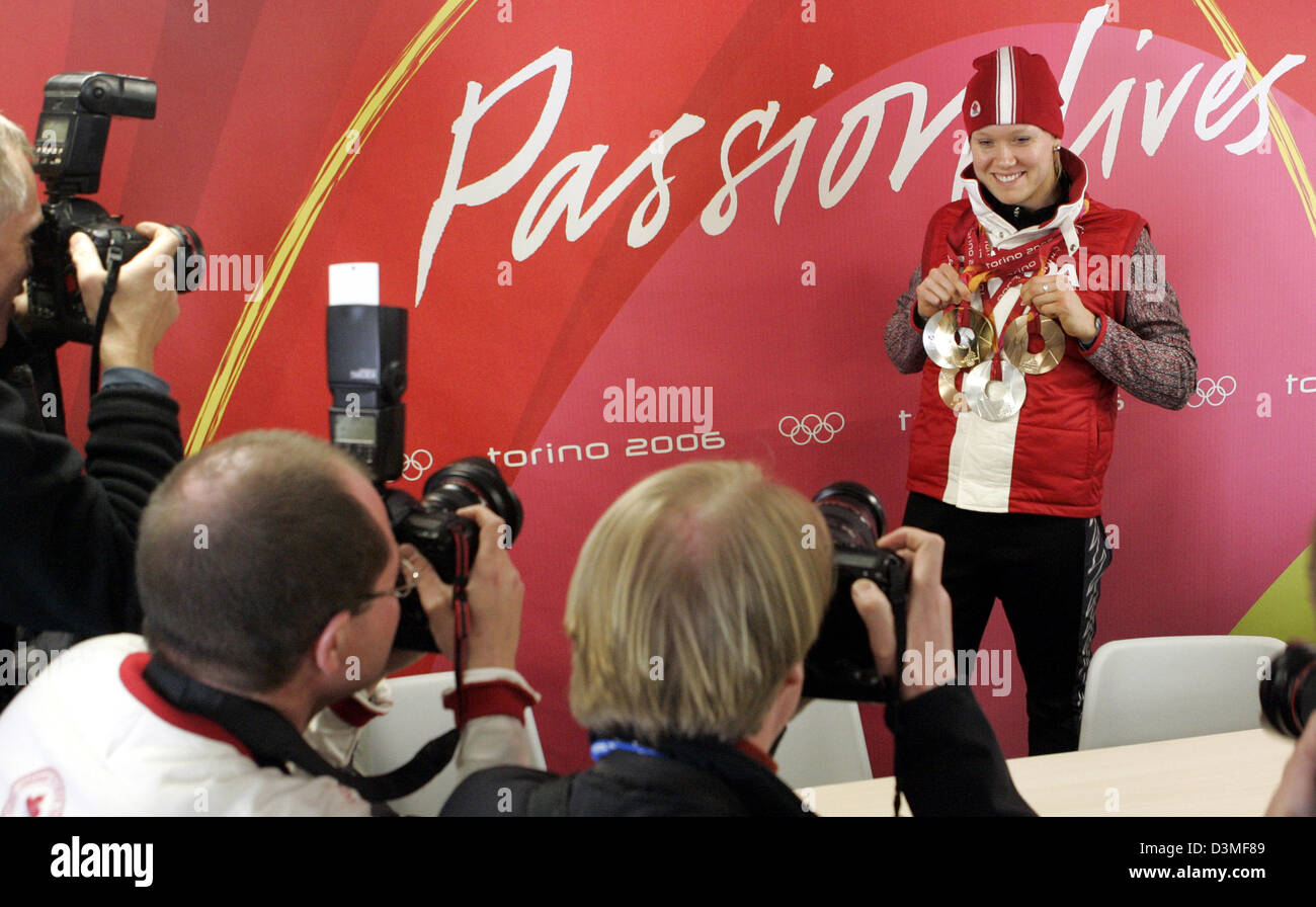 (dpa) - Canadian speed skater Cindy Klassen presents her five medals at the ice speed skating rink in Torino, Italy, 25 February 2006. Photo: Frank May Stock Photo