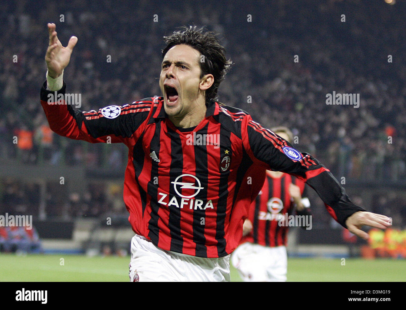 AC Milan's Filippo Inzaghi celebrates his second goal against FC Bayern Munich during the UEFA Champions League round of last 16 clash at the Giuseppe-Meazza stadium in Milan, Italy, Wednesday, 08 March 2006. Deadlocked at 1-1 after the first leg, Inzaghi headed Milan ahead in the San Siro from Serginho's cross. Shevchenko missed a penalty but made up for it two minutes later by he Stock Photo