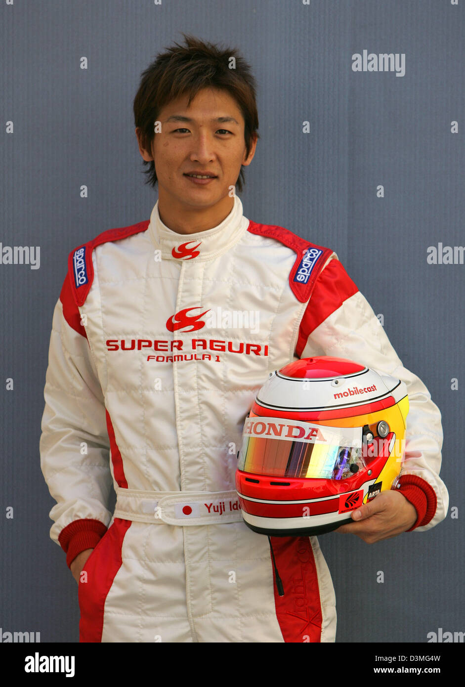 Japanese Formula One driver Yuji Ide of Super Aguri poses for photographers at the Bahrain Formula One race track near Manama, Bahrain, Thursday 09 March 2006. The first race of the F1 world championship 2006, the Grand Prix of Bahrain, will take place here on Sunday 12 March 2006. Photo: Carmen Jaspersen +++(c) dpa - Bildfunk+++ Stock Photo