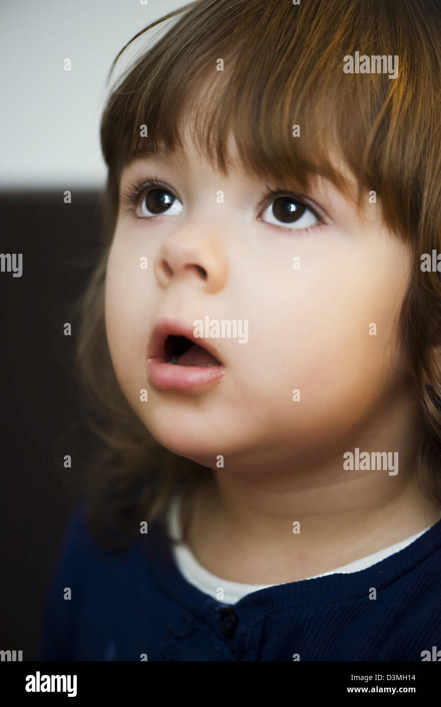 Surprised little beautiful girl. portrait Stock Photo - Alamy