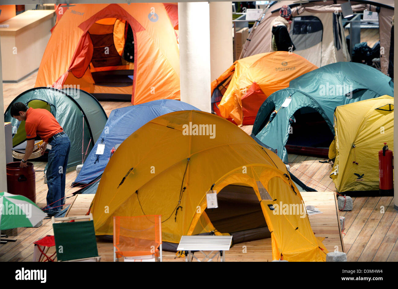 A member of staff works in the ten department of Globetrotter Ausruestung, Europe's biggest dealer specialised in outdoor and travelling equipment in Cologne, Germany, 21 March 2006. 20,000 products are offered on four floors of 7000 square metres at total. Photo: Rolf Vennenbernd Stock Photo