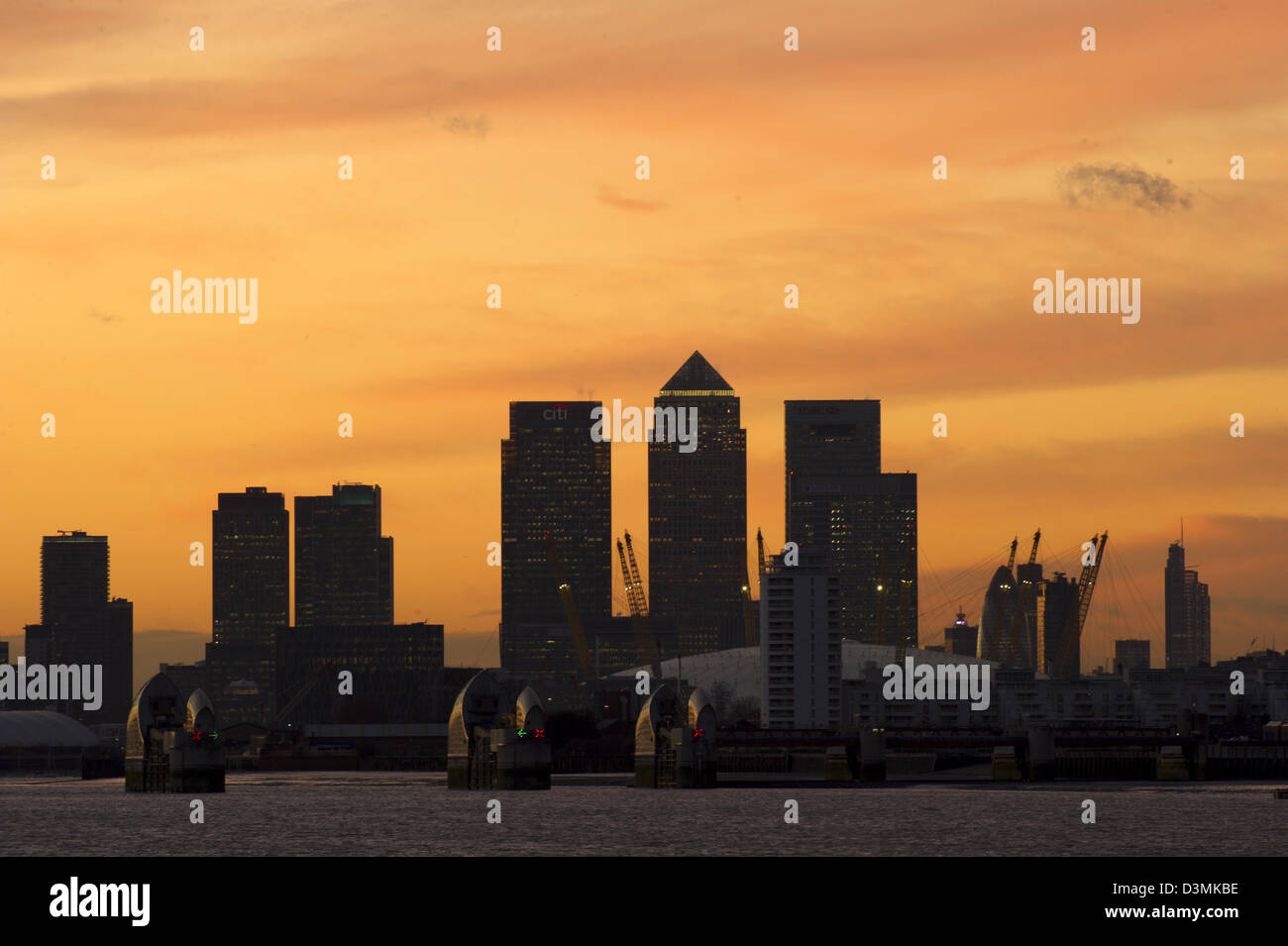 The outline of buildings at Canary Wharf in London are seen in ...