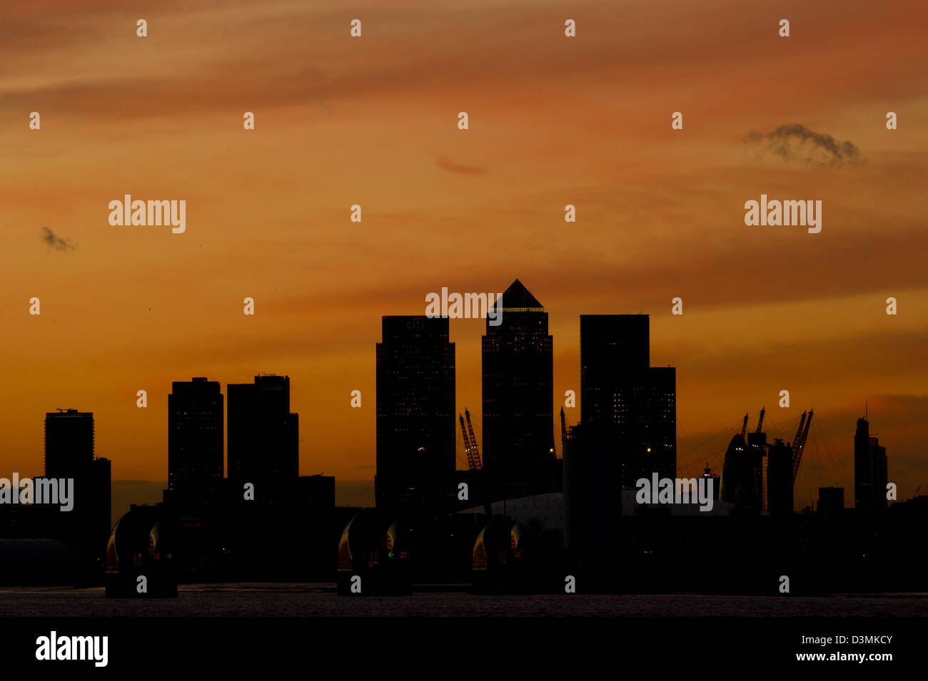 The outline of buildings at Canary Wharf in London are seen in ...