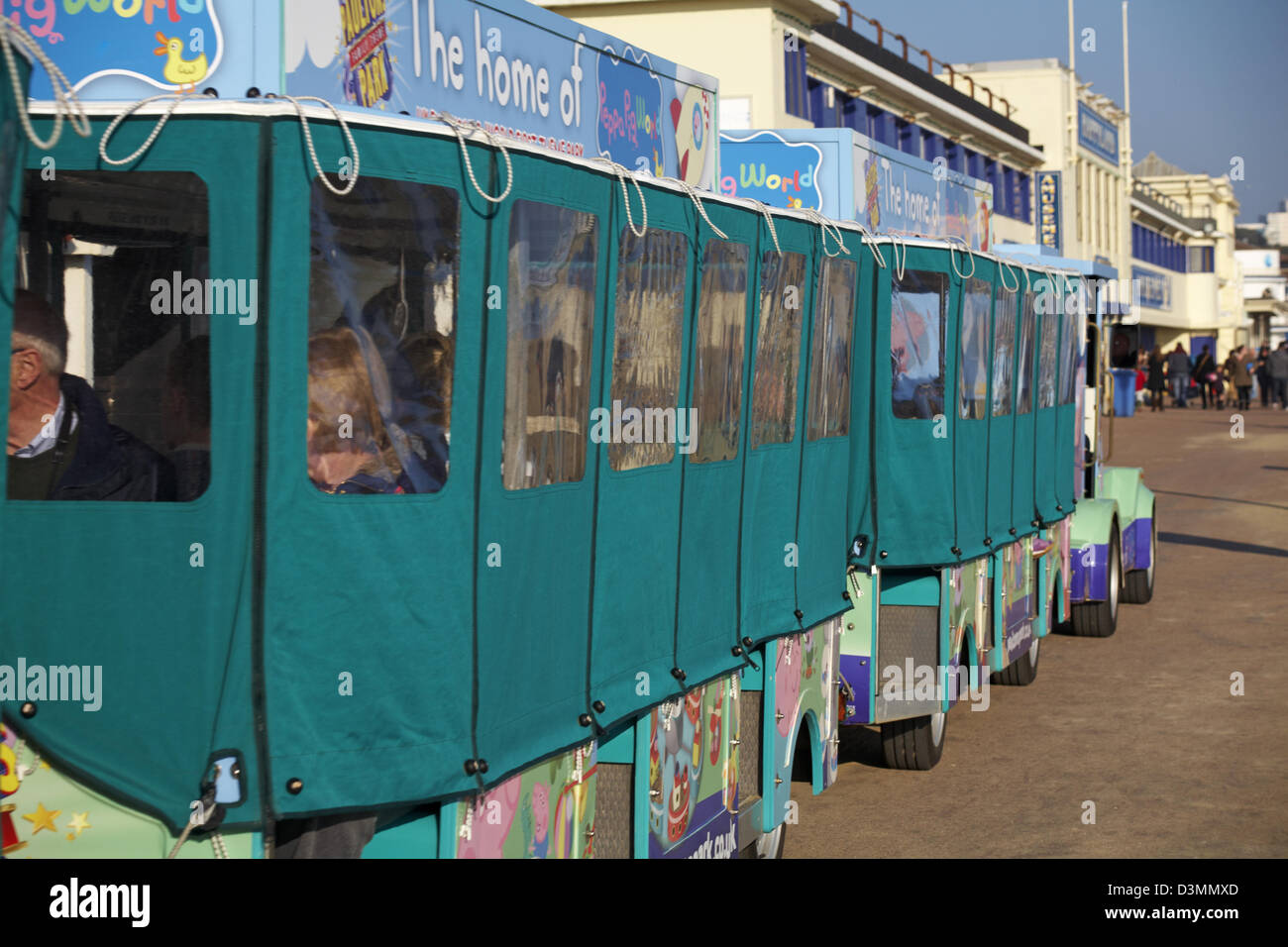 The home of Peppa Pig world - Landtrain taking passengers along the promenade at Bournemouth in February Stock Photo
