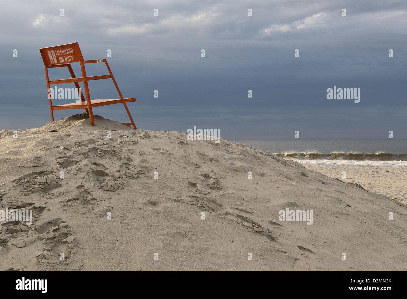 A Long Beach, Long Island, New York lifeguard chair overlooking the Atlantic Ocean in early morning light. Stock Photo