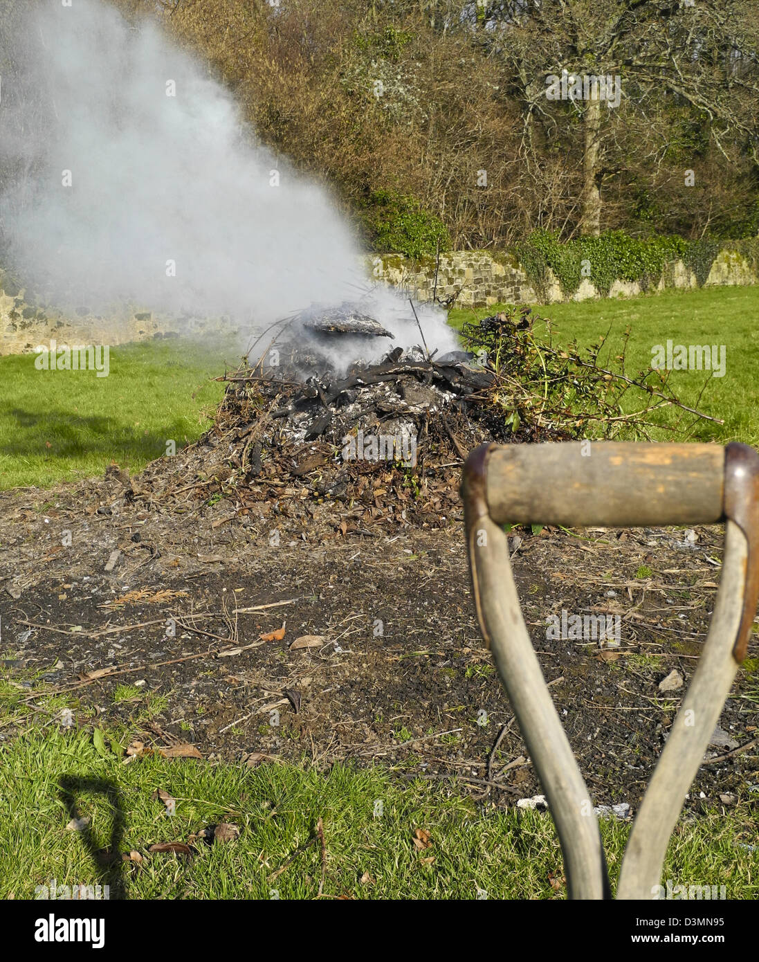 A garden bonfire burning garden waste Stock Photo Alamy