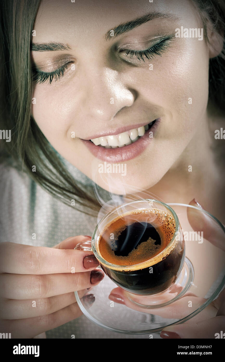 beautiful girl drinks coffee Stock Photo