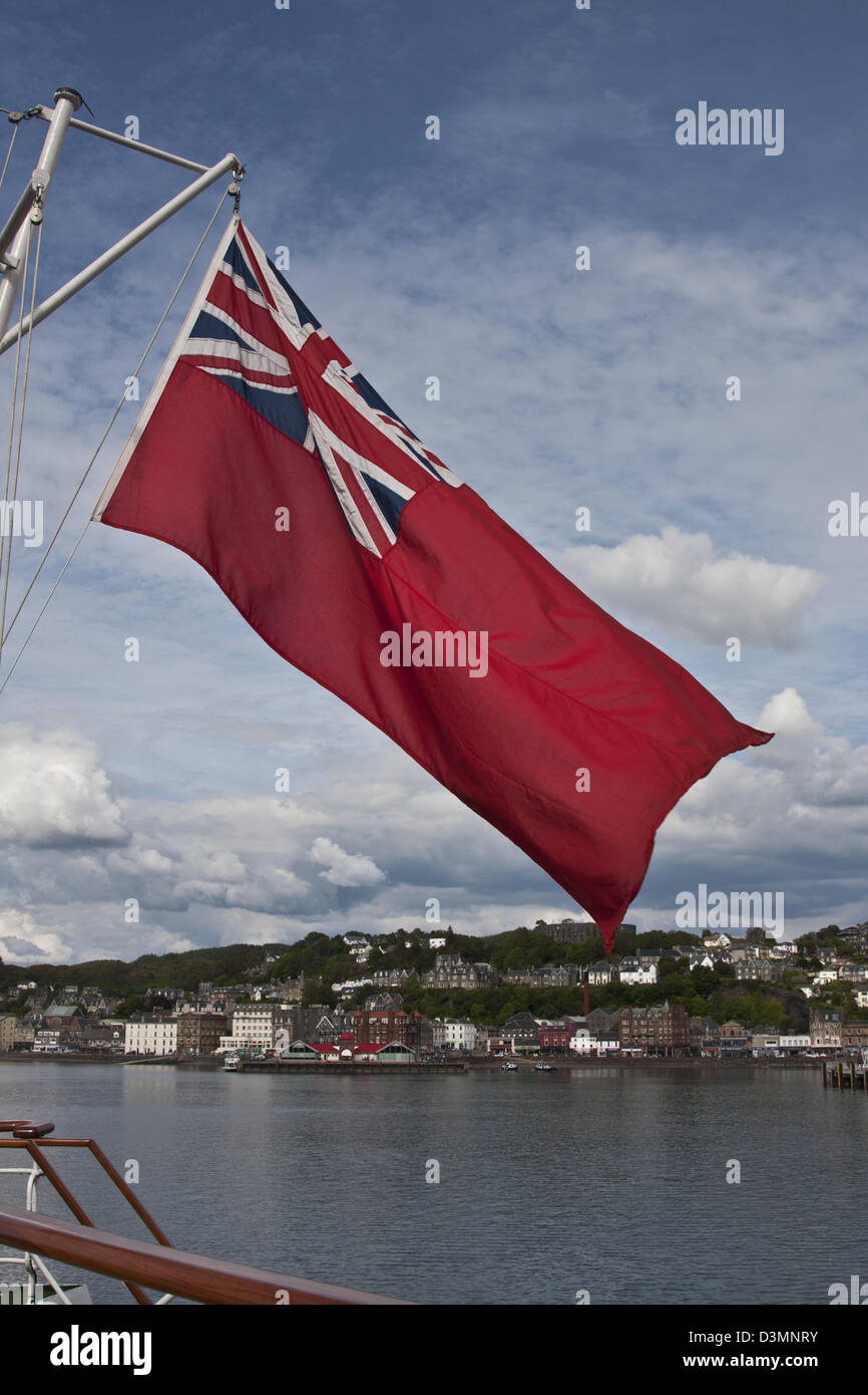 Oban, Scotland, The British Merchant Navy Ensign, also called the Red Ensign, flying from the cruise ship Hebridean Princess. Stock Photo