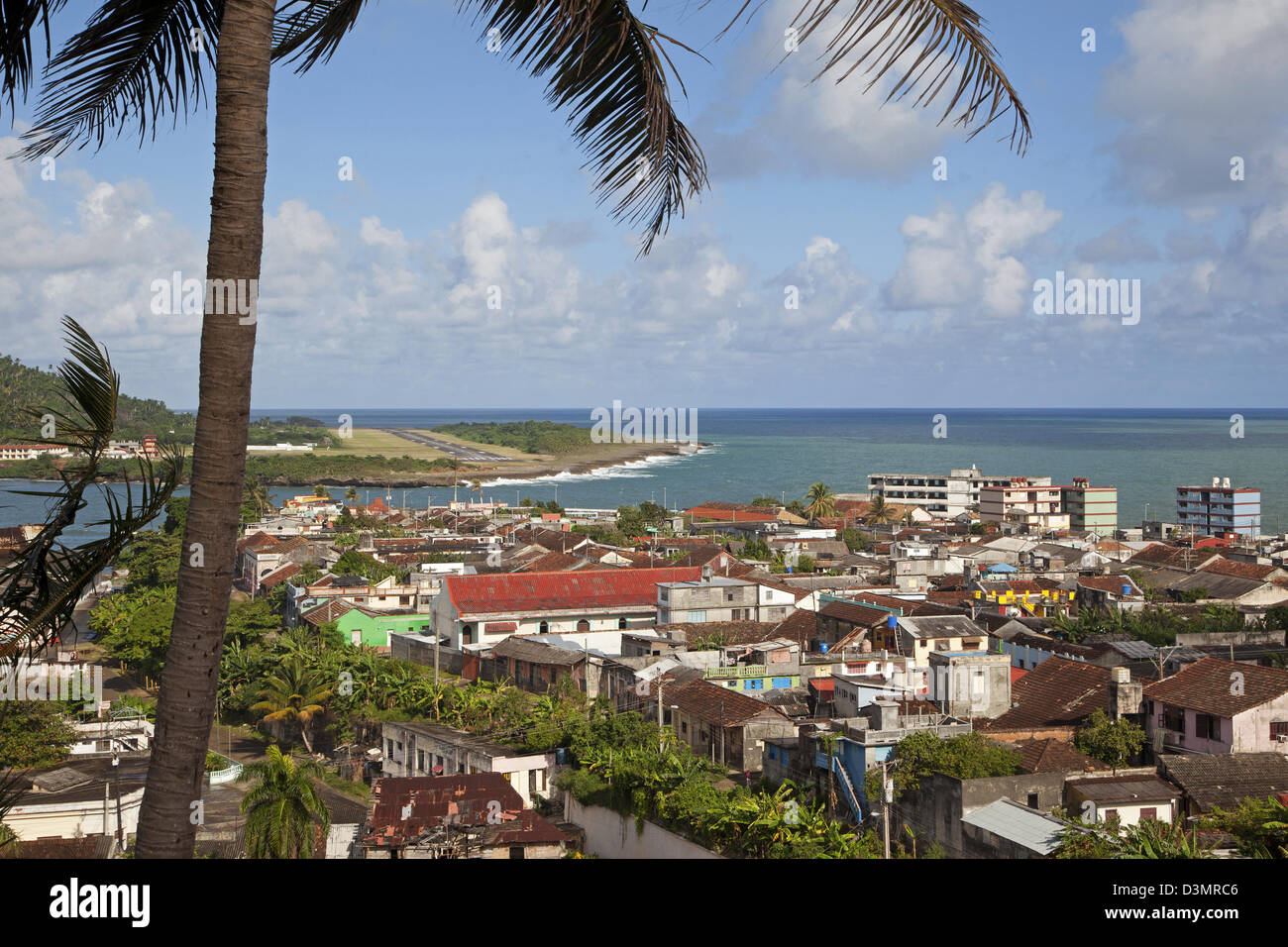 View over the city Baracoa with its apartments in Sovjet style and the Bay of Honey / Bahía de Miel, Guantánamo Province, Cuba Stock Photo