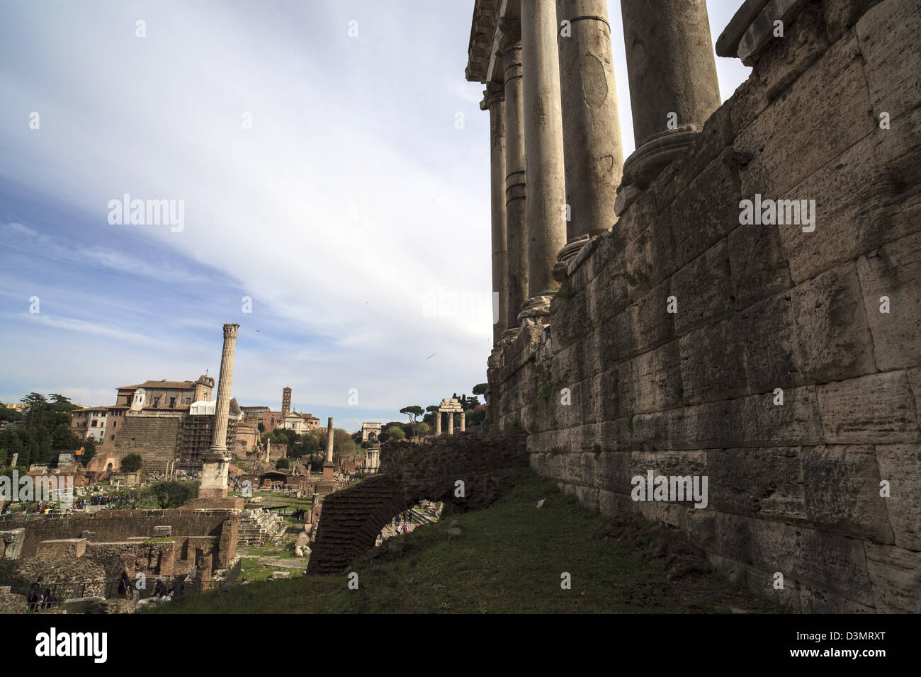 Surviving columns of the Temple of Saturn in the Imperial Forum in Rome Italy Stock Photo