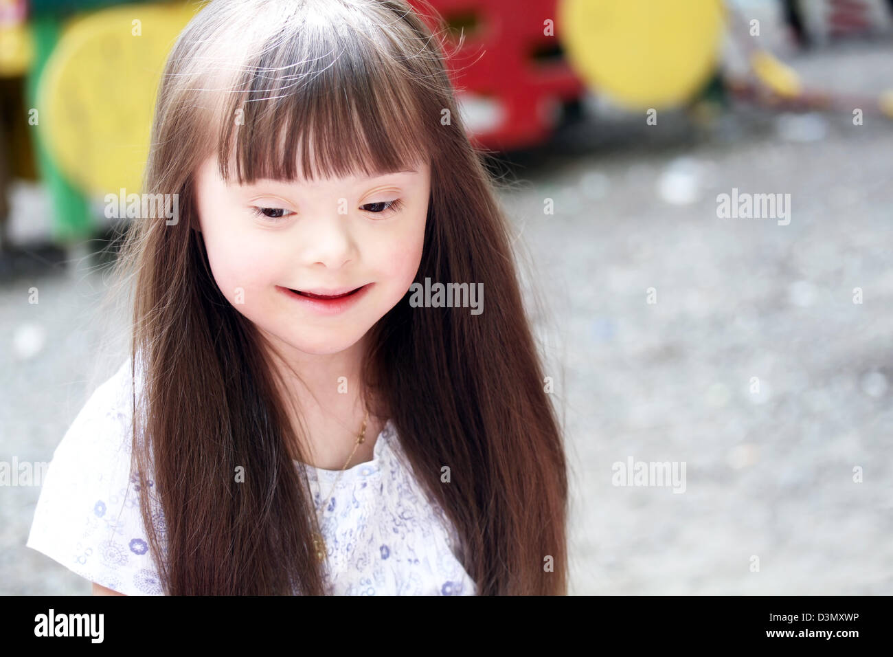 Portrait of beautiful young girl on the playground Stock Photo - Alamy