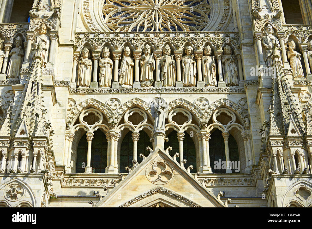 Gothic statues and the facade of the Gothic Cathedral of NotreDame